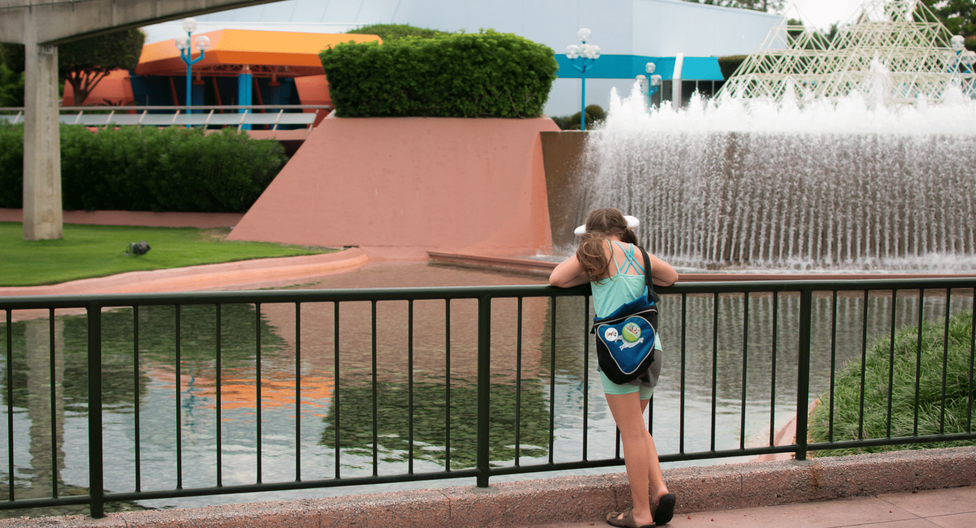 Young Girl looking at water at Epcot