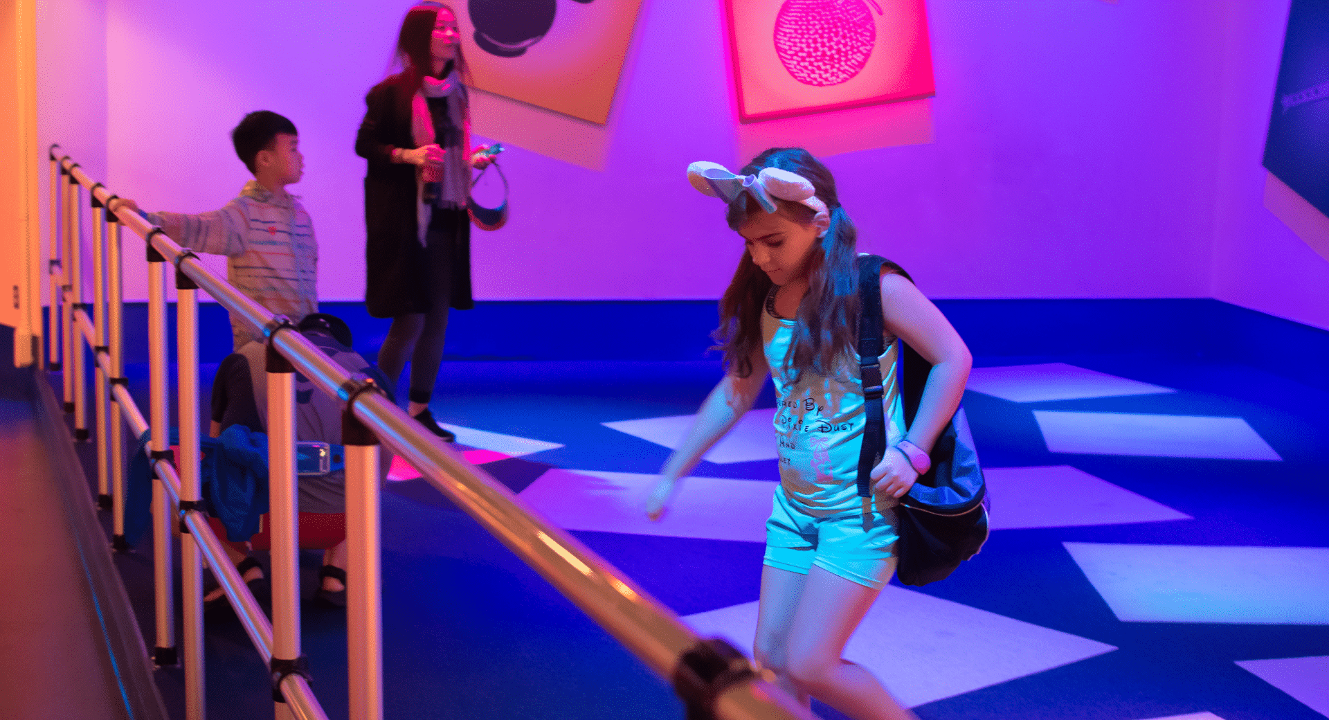 Young girl playing in the Imagination Lab at Epcot