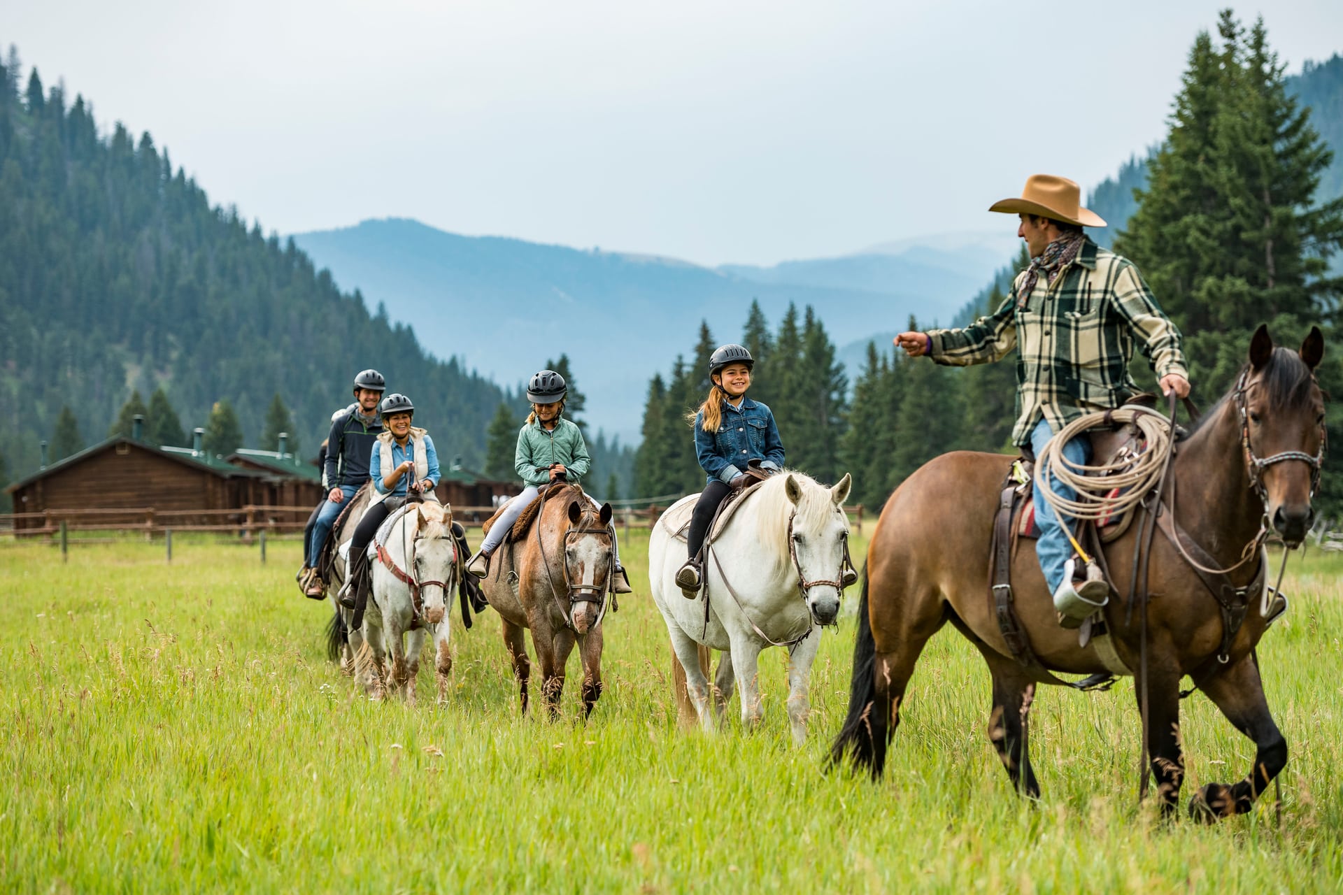 Guest horseback riding on an Adventures By Disney trip in Wyoming ©Disney
