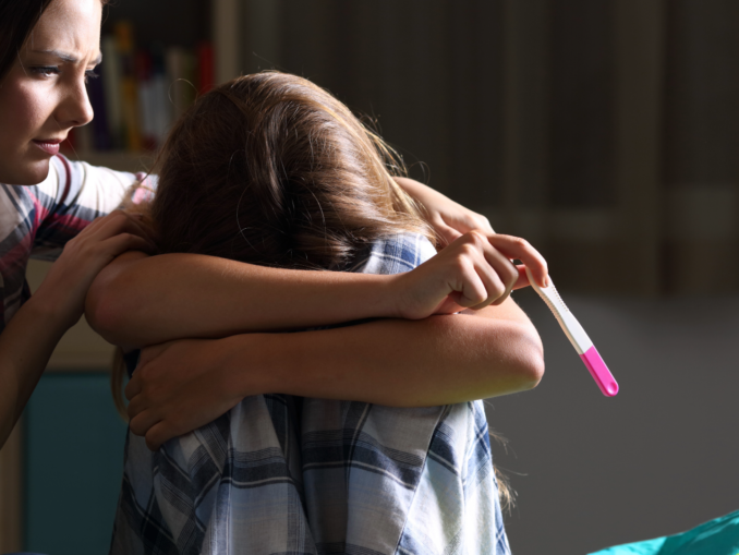 pregnant teen and friend upset