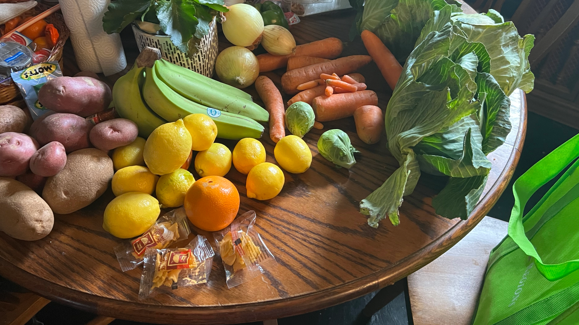 lemons, potatoes, carrots, onions, cabbages caught at a St. Patrick's Day parade in New Orleans on a table