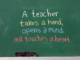 Chalkboard with text "a teacher takes a hand, opens a mind and touches a heart"
